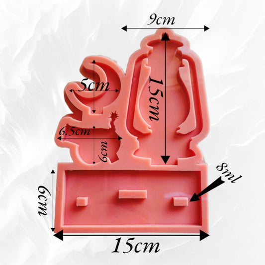 A mold in the shape of a lantern, cannon and crescent