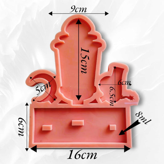 A mold in the shape of a lantern, cannon and crescent
