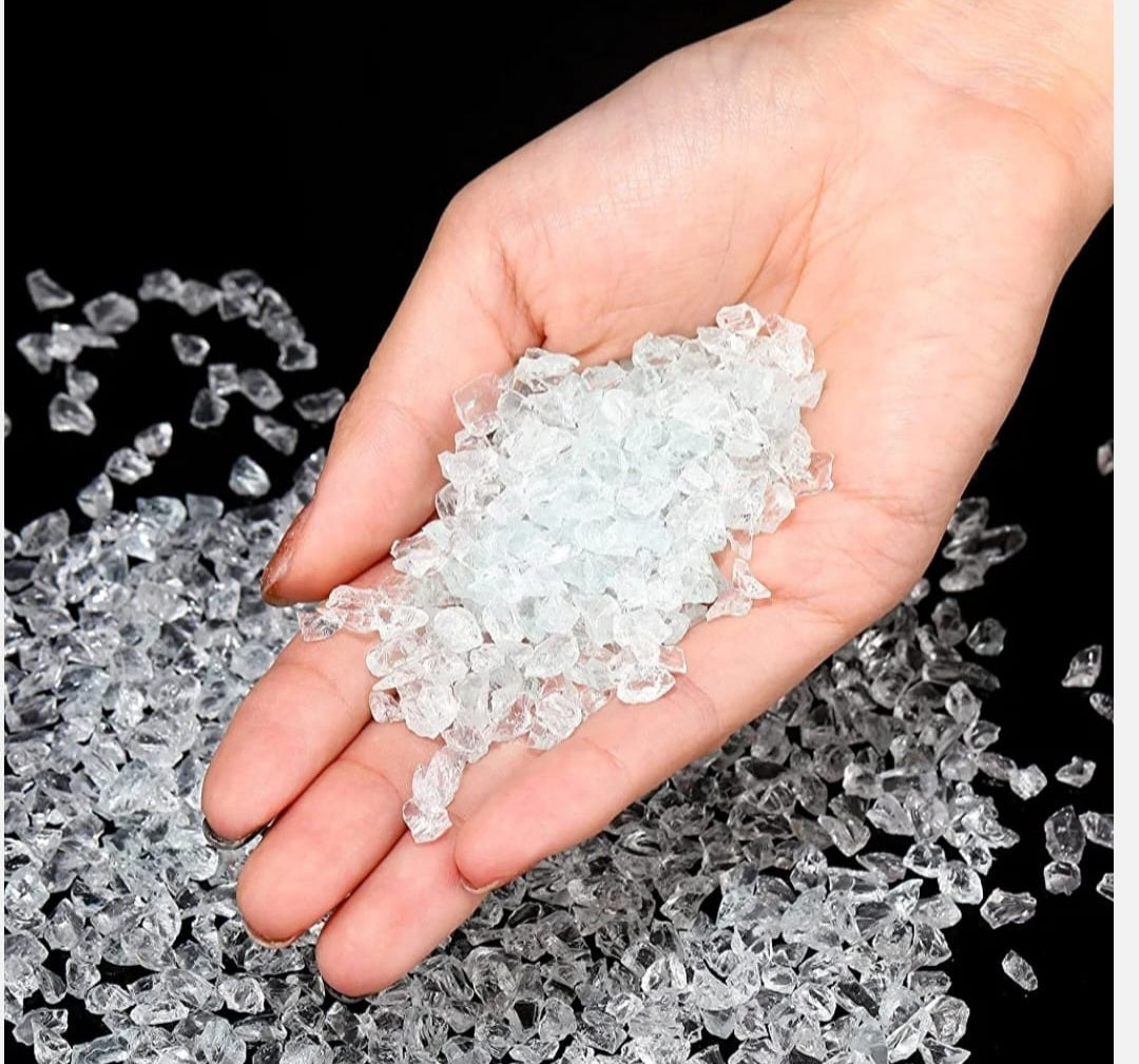 A collection of unpainted crystal glass in its natural, sparkling colors.