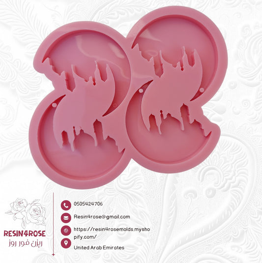 A silicone mold containing a Ramadan crescent with a mosque inside. This mold is a unique addition due to the complexity of its geometric patterns and its integrated design. It is suitable for casting resin, wax, plaster, or pottery