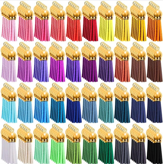 A large and varied collection of decorative tassels comes in a very wide range of vibrant and gradient colors. Each tassel features a gold metal head and a hanging loop, making it suitable for crafts, resin art, medallions, and embellishing accessories
