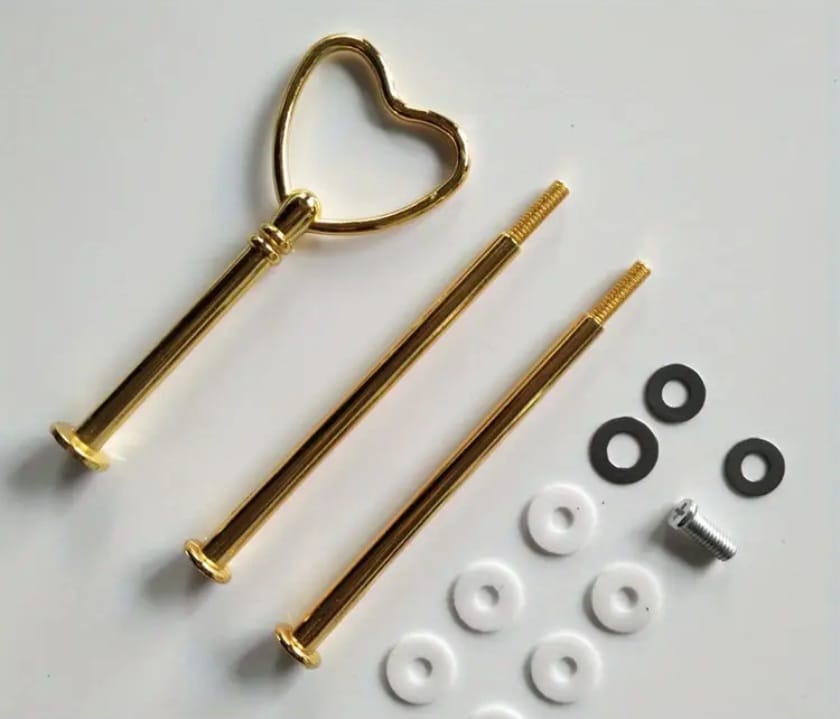 A metal heart-shaped serving tray holder set designed to assemble multi-tiered cake and dessert trays (up to 3 tiers)