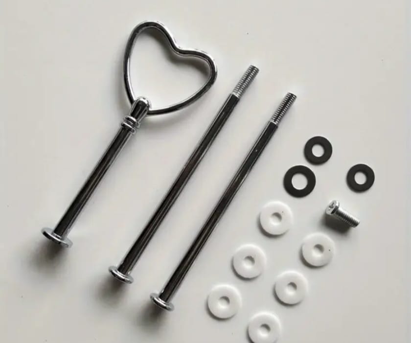 A metal heart-shaped serving tray holder set designed to assemble multi-tiered cake and dessert trays (up to 3 tiers)