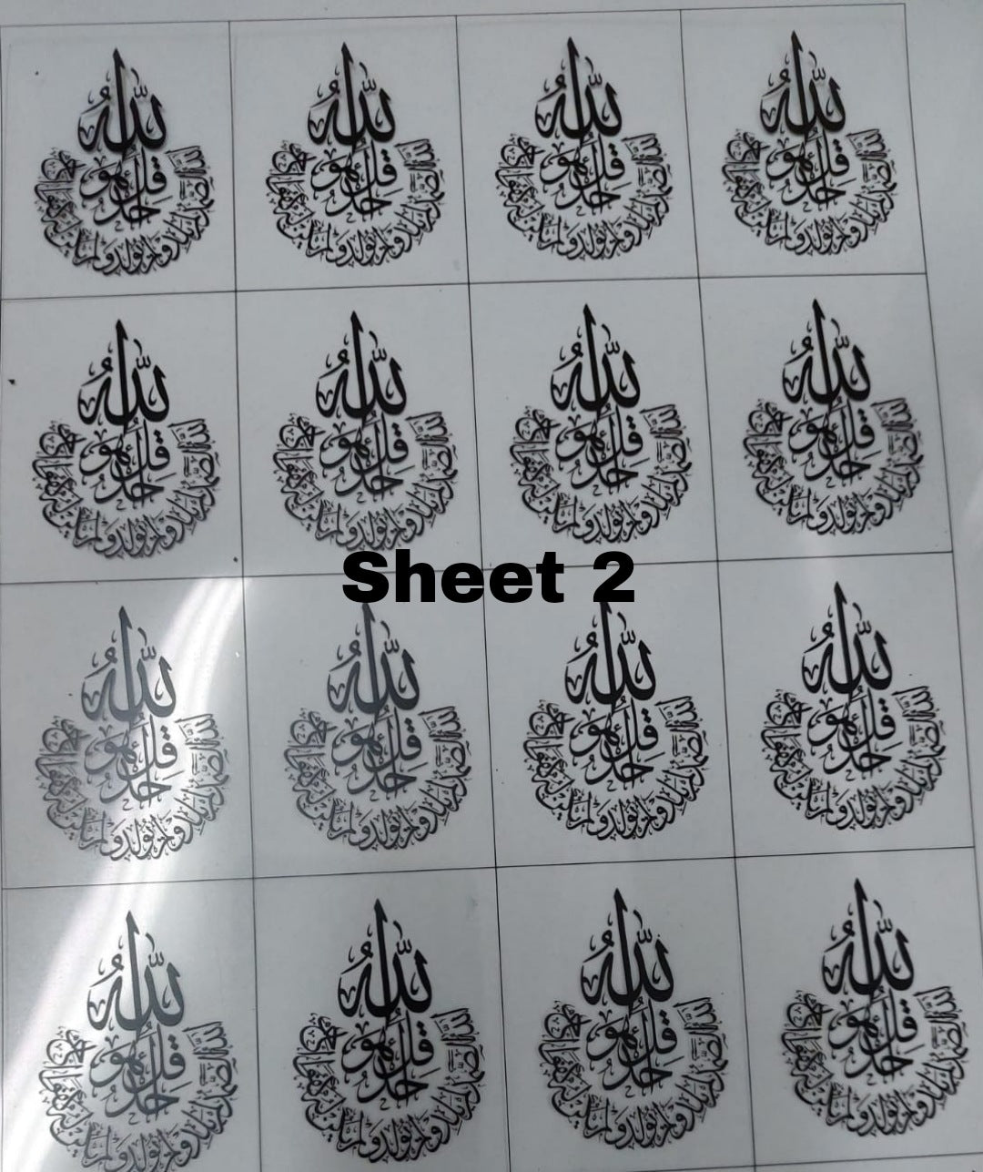 This type of repeated text is used to be included inside resin molds, or to be glued onto car pendants and medals as handicrafts.